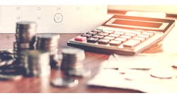 Calculator Taxes Calendar Money Banking Funds Cash Bread Dough Etc &copy; Siriporn Kaenseeya Dreamstime