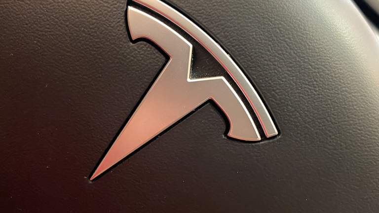 Tesla Logo Steering Wheel Detail Joni Hanebutt Dreamstime 5fbe04c880015 611a8e921f6e9