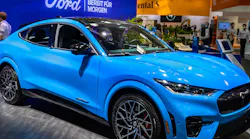 Ford Mustang Mach E Electric Vehicle Car Blue In Showroom At Car Show © Vander Wolf Images Dreamstime