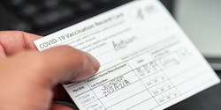 Filled In Vaccination Card Covid 19&copy; Antwon Mcmullen Dreamstime