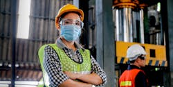 Factory Worker In Mask