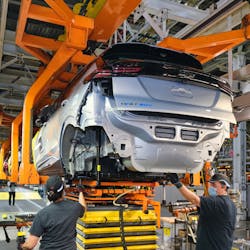 GM shut down most of its assembly plants temporarily in September because of the chip shortage. Here, workers assemble a 2022 Chevy Bolt at GM's Lake Orion plant in Michigan, one of the plants affected. GM shut down most of its assembly plants temporarily in September because of the chip shortage. Here, workers assemble a 2022 Chevy Bolt at GM's Lake Orion plant in Michigan, one of the plants affected.