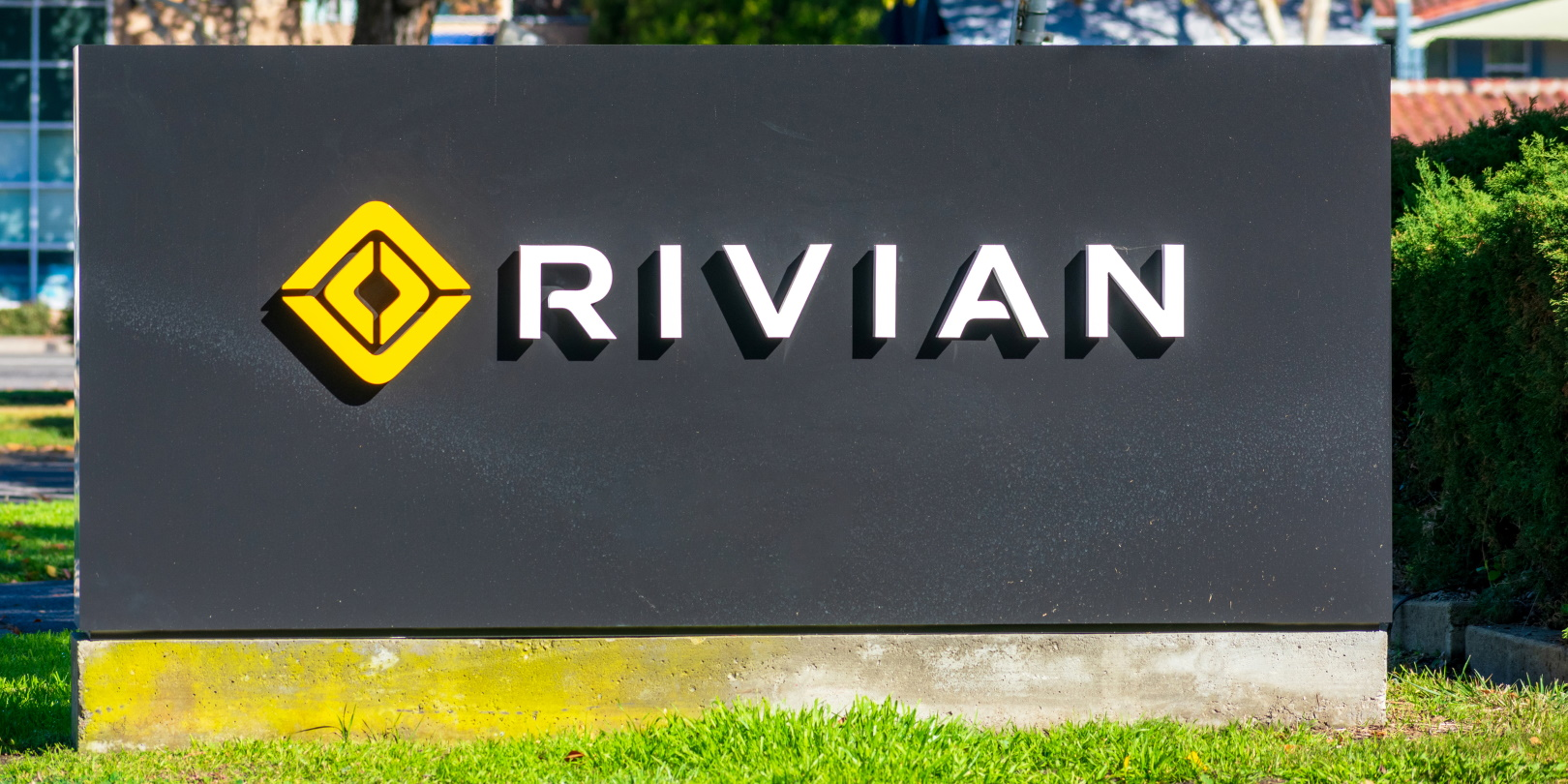 A sign showing the Rivian Co. logo at its Silicon Valley headquarters.