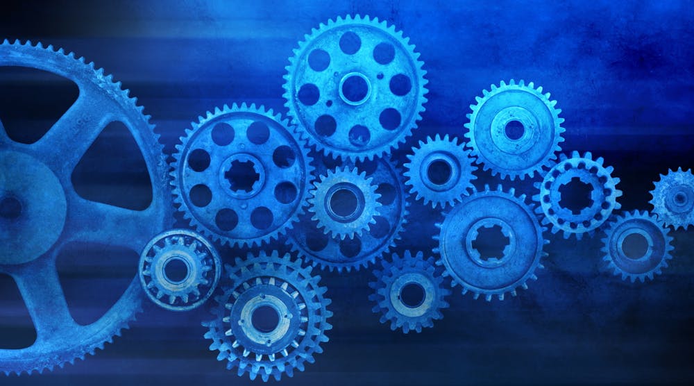 A system of gears against a blue background. An abstract representation of manufacturing and industry.