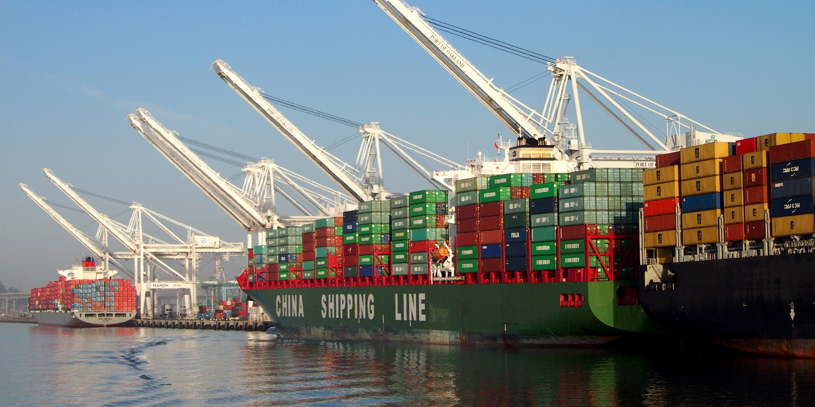 A container ship operated by China Shipping Line unloads its cargo in Oakland harbor.