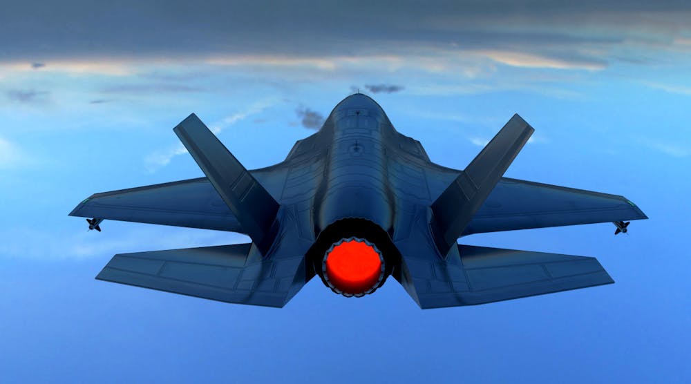 A Lockheed-Martin F-35 fighter jet in flight, with clouds visible in the background.