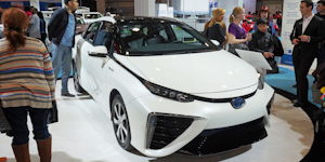 The hydrogen-powered Toyota Mirai at an auto show.