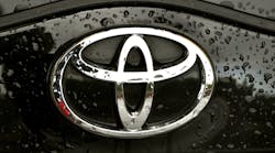 Toyota Logo Black Rain On Hood Of Car &copy; Nicoleta Raluca Tudor Dreamstime