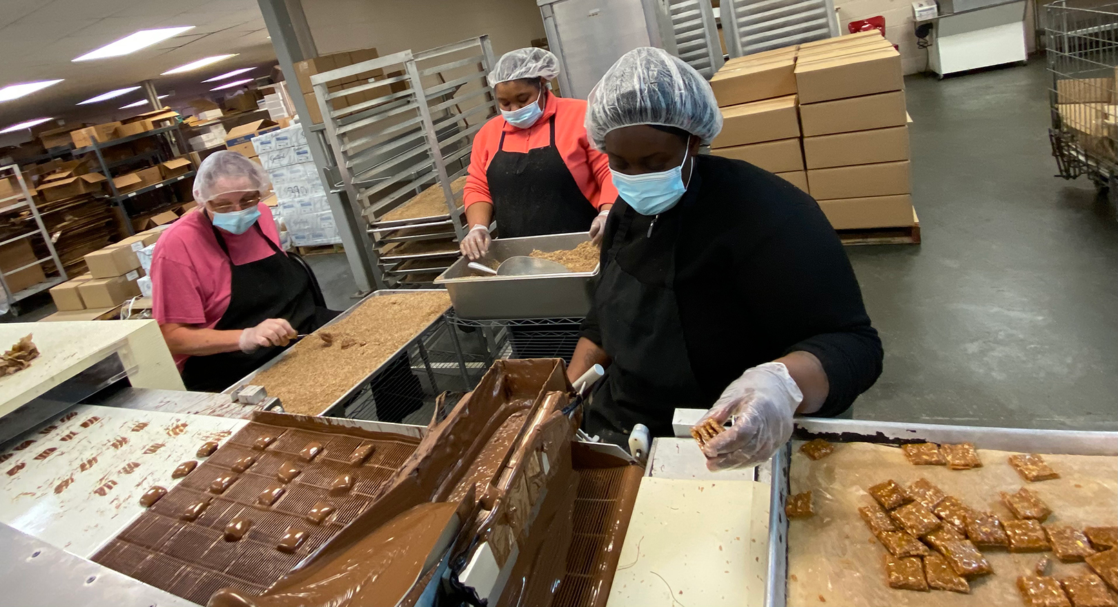 Employees at Stuckey's factory in Wrens, Georgia, make the iconic candies that will eventually bear the family company's name and logos.