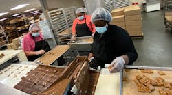 Employees at Stuckey&apos;s factory in Wrens, Georgia, make the iconic candies that will eventually bear the family company&apos;s name and logos.