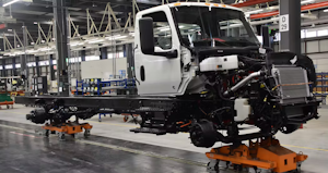 Cab And Chassis Move Through Plant On