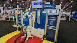 A mobile robot autonomously manages a machine tool at Yaskawa&apos;s booth at the Automate trade show in Detroit.