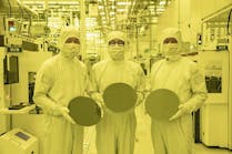 Samsung researchers in Korea display new microchip wafers made using cutting-edge technology.