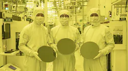 Samsung researchers in Korea display new microchip wafers made using cutting-edge technology.