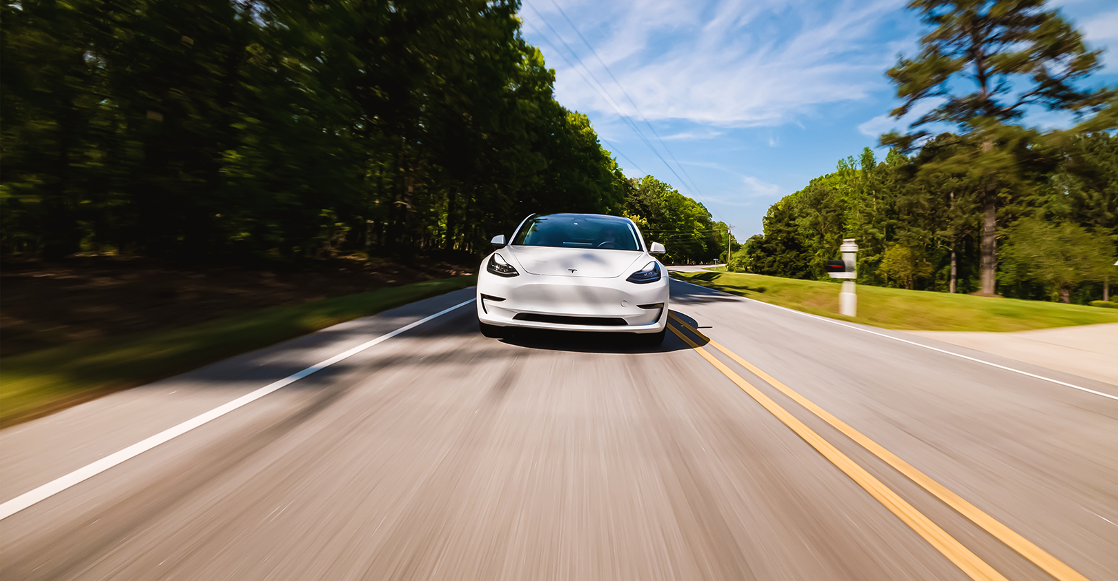 Tesla Model S On The Road 62e40224ab8cc