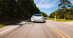 Tesla Model S On The Road 62e40224ab8cc