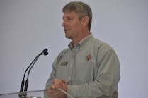Navistar&apos;s Rod Spencer speaking at the San Antonio plant&apos;s grand opening in April.