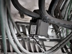 Sensors employed by the Guidewheel system clip to power cables to record downtime events. Sensors employed by the Guidewheel system clip to power cables to record downtime events.