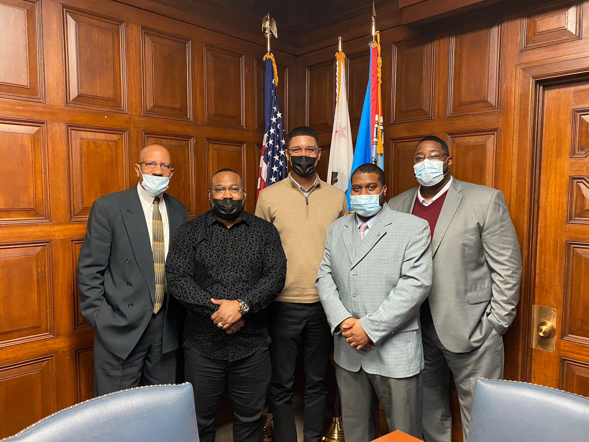 Mac Smith (front left) engages with civic leaders to develop programs aimed at breaking the cycle of poverty. He is pictured here with Stockton Mayor Kevin Lincoln in the center. The others pictured are with My Brother&rsquo;s Keeper Alliance and include William Lattimore (left-most), Aaron Edwards (second from right) and Charles Johnson (right-most).