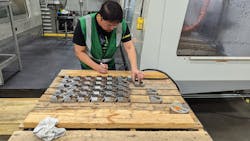 Wilfredo Magbag catalogs ram guides produced in a two-machine cell. Texas Oil Tools uses many forms of color coding—the green vest marks Magbag as a new employee , and the orange spray paint on the steel billet notes that it cleared rigorous materials testing. Wilfredo Magbag catalogs ram guides produced in a two-machine cell. Texas Oil Tools uses many forms of color coding—the green vest marks Magbag as a new employee , and the orange spray paint on the steel billet notes that it cleared rigorous materials testing.