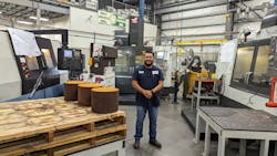 CNC machinist 'Super' Mario Perla runs a three-machine cell that produces caps and bonnets used in oil drilling safety equipment. The cell arrangement eliminated excess work in progress. CNC machinist 'Super' Mario Perla runs a three-machine cell that produces caps and bonnets used in oil drilling safety equipment. The cell arrangement eliminated excess work in progress.