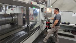 Jose Pesina runs a 5-axis Mori Seiki lathe with machining capabilities. The two-machine cell lowered waste and work-in-process at the plant.