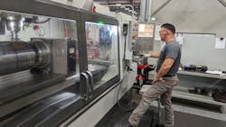 Jose Pesina runs a 5-axis Mori Seiki lathe with machining capabilities. The two-machine cell lowered waste and work-in-process at the plant. Jose Pesina runs a 5-axis Mori Seiki lathe with machining capabilities. The two-machine cell lowered waste and work-in-process at the plant.