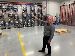 Tony Munger, supervisor in the blanks departments, explains the wall storage handiwork that his team built. Tony Munger, supervisor in the blanks departments, explains the wall storage handiwork that his team built.