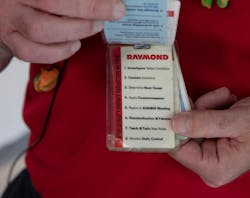 Raymond Corp. Director of Operations Michael Kretzmer keeps problem-solving reminders close at hand, on a lanyard around his neck. Raymond Corp. Director of Operations Michael Kretzmer keeps problem-solving reminders close at hand, on a lanyard around his neck.