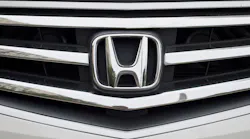 Honda Logo On Grille Of Car© Vyacheslav Bukhal Dreamstime