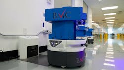 One of BMC's autonomous mobile robots approaches a charging port. One of BMC's autonomous mobile robots approaches a charging port.