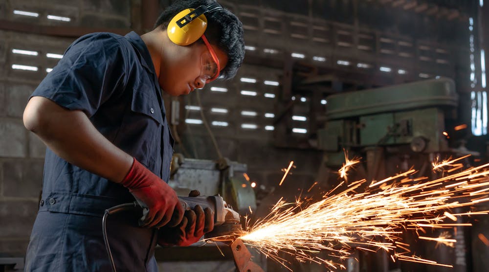 Engineer Operating Angle Grinder Hand Tools Manufacturing Factory Mechanical&copy; Omar Osman Dreamstime