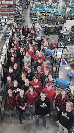 MCL workers wore red and black in October to show support for the Pulaski, Wisconsin, community after a recent fire.