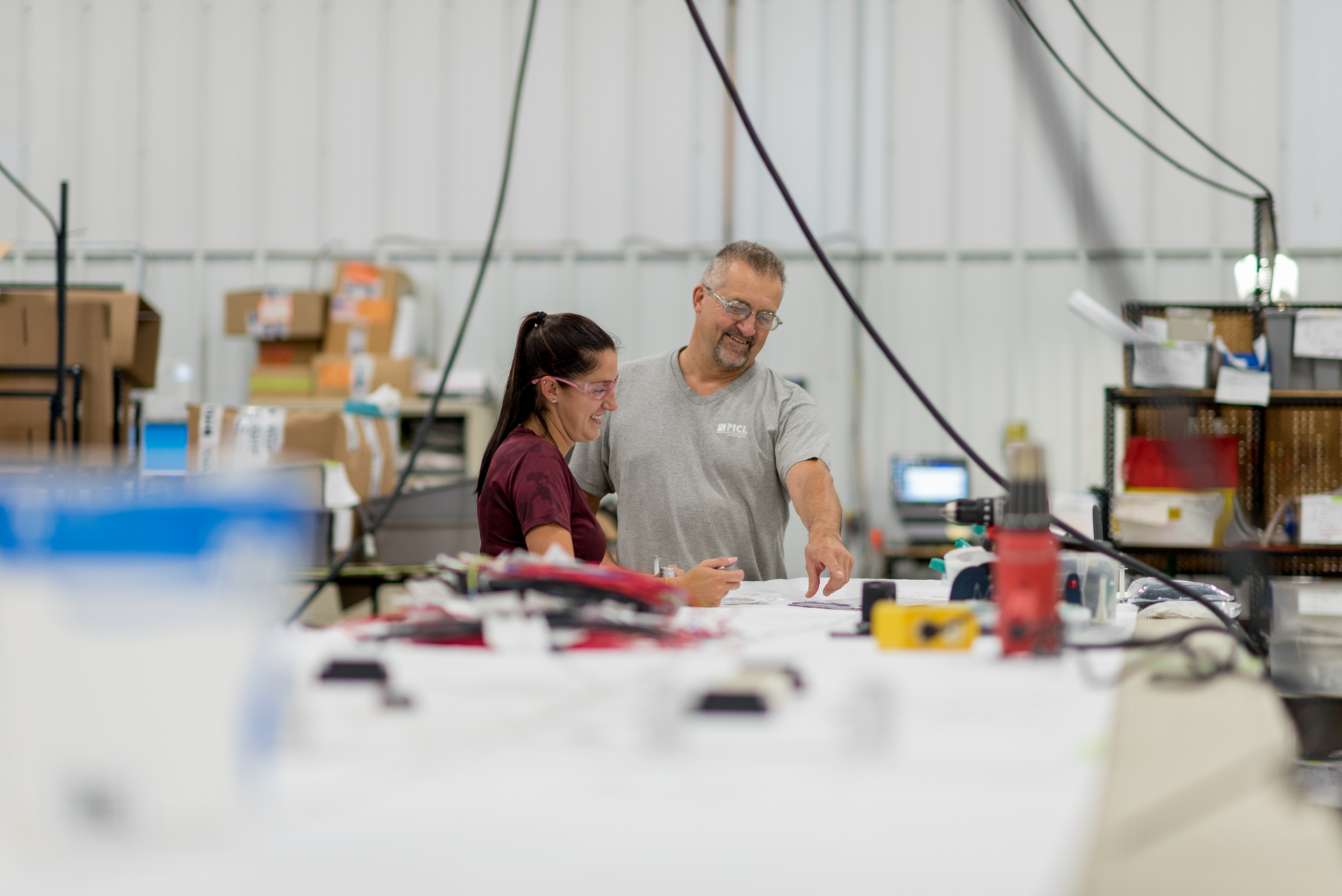 Workers collaborate at MCL Industries in Wisconsin.