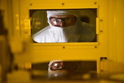 An Intel production worker in Hillsboro, Oregon, produces semiconductors in a cleanroom environment. An Intel production worker in Hillsboro, Oregon, produces semiconductors in a cleanroom environment.