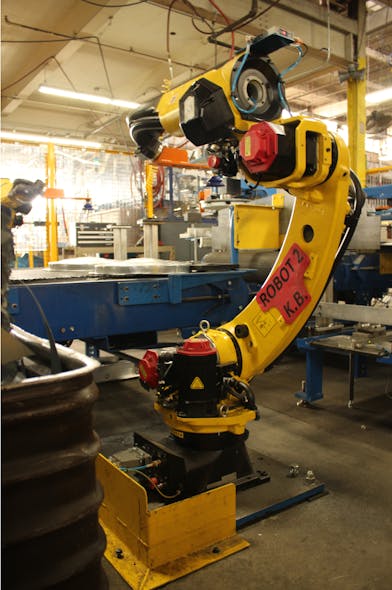 The Fanuc industrial robot at the heart of Behrens Metalware&apos;s automated cell for can cover production.