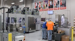 One of the fill lines at the Cedar Rapids plant. The board on the wall displays machine performance. One of the fill lines at the Cedar Rapids plant. The board on the wall displays machine performance.