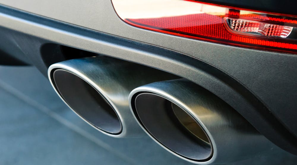 Closeup Of A Car Dual Exhaust Pipe Emissions Concept Automotive Sergey Rasulov Dreamstime