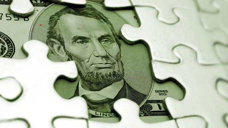 6566571bcb8c3a001de53034 Cash Puzzle Les Cunliffe Dreamstime