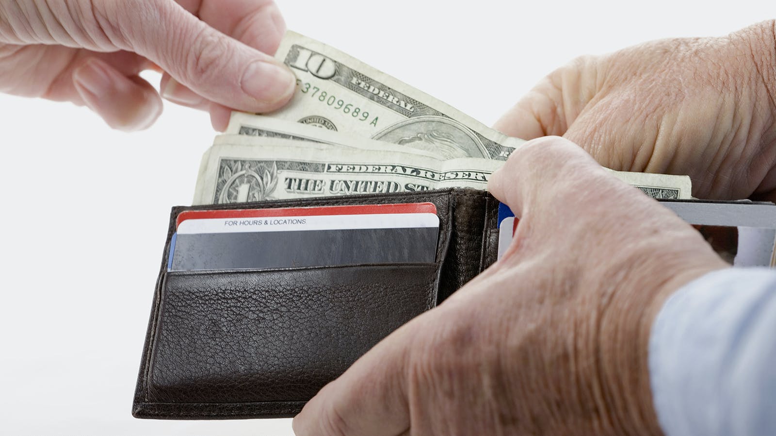 6584646b21eb6e001ec16b38 Moneyinwalletdreamstime L 1810216