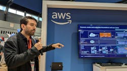 Francisco Javier Franco Espinoza, a strategy and innovations manager for Siemens Factory Automation, discusses digital manufacturing in the AWS booth. Francisco Javier Franco Espinoza, a strategy and innovations manager for Siemens Factory Automation, discusses digital manufacturing in the AWS booth.