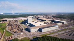 A Nucor electric arc minimill. A Nucor electric arc minimill.