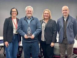 Hoffer Plastics Co-CEO Charlotte Canning (left), IndustryWeek Editor-in-Chief Robert Schoenberger, Hoffer Co-CEO Gretchen Hoffer Farb and Hoffer Co-CEO Alex Hoffer stand with an IndustryWeek Best Plants Award for 2024 at the company's plant in South Elgin, Illinois. Hoffer Plastics Co-CEO Charlotte Canning (left), IndustryWeek Editor-in-Chief Robert Schoenberger, Hoffer Co-CEO Gretchen Hoffer Farb and Hoffer Co-CEO Alex Hoffer stand with an IndustryWeek Best Plants Award for 2024 at the company's plant in South Elgin, Illinois.