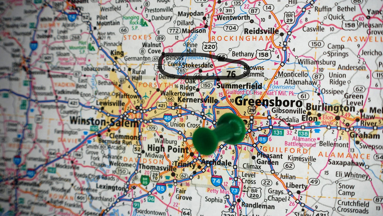 close-up view of North Carolina map near Greensboro, with green pin in Greensboro