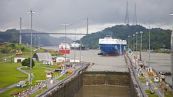 Three cargo ships nearing lock at the Panama Canal Three cargo ships nearing lock at the Panama Canal
