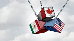 three shipping containers dangling from chains in the air. one shows US flag, one shows Canada flag, and one shows Mexico flag