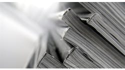 close up of the spine of several magazines close up of the spine of several magazines