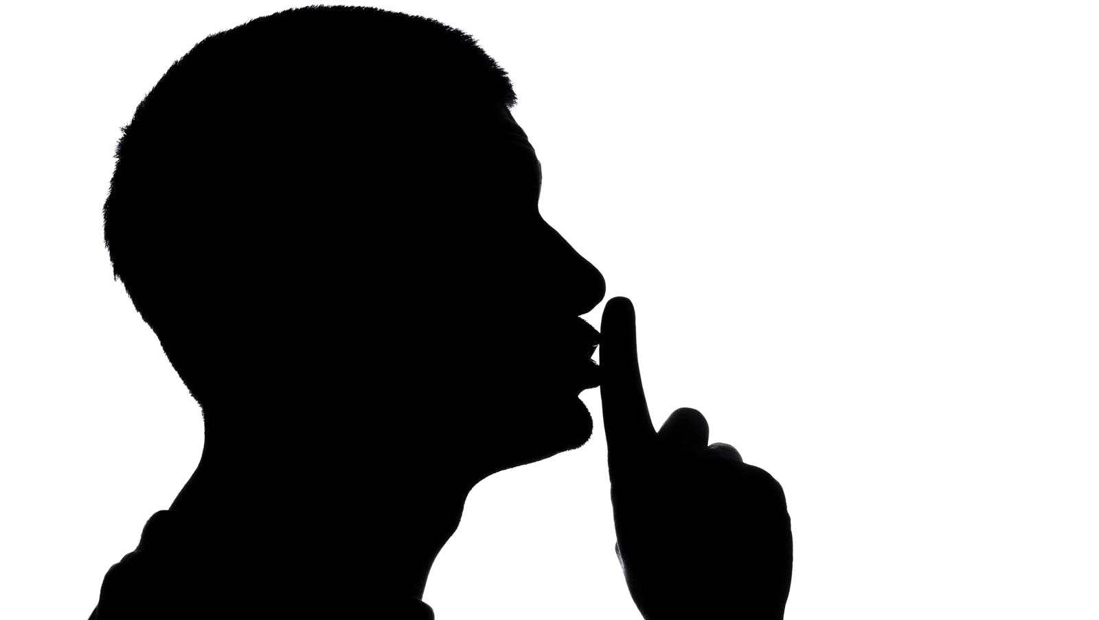 silhouette of person telling some to be quiet