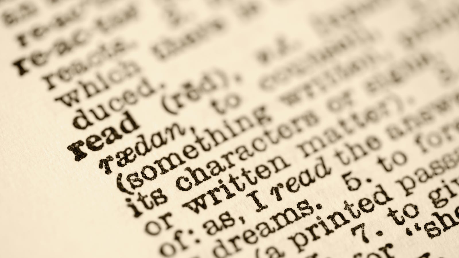 closeup view of dictionary showing the word 'read'