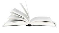 closeup of open book against white background closeup of open book against white background